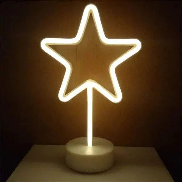 LED Neon Light shaped like a five-point star glowing bright white on a round white base