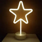LED Neon Light shaped like a five-point star glowing bright white on a round white base