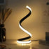 LED Spiral Table Lamp with black spiral design and integrated warm white LED light strip providing modern ambient illumination