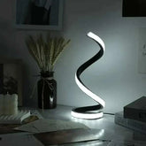 LED Spiral Table Lamp with black spiral base and bright white LED light, modern and sleek design for bedroom or desk use