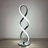 LED Table Lamp featuring a modern silver twisted infinity loop design with integrated white LED lighting on a round base