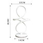 LED Table Lamp with sleek white looped design, modern minimalist style with integrated light source and round base