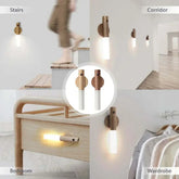 LuminaFlex Wireless Night Light wall-mounted with wood accent and frosted acrylic diffuser, providing warm white illumination in stairs, corridor, bedroom, and wardrobe settings