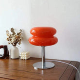 Macaron LED Lamp with glossy red double-disc shade, chrome stem and round metal base
