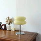 Macaron LED Lamp with pale yellow stacked oval shade, chrome stem and round metal base