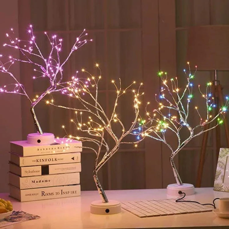 Mini Christmas Tree LED lamp with flexible silver wire branches illuminated by multicolored warm LED lights for festive decor