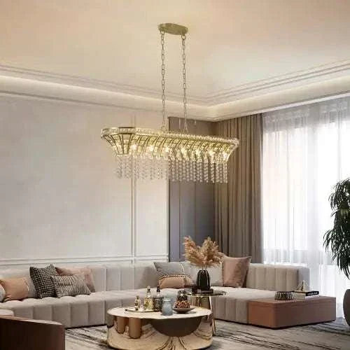 Modern Champagne Gold Kitchen Island Lamp with oval shape, crystal droplets hanging from gold metal frame in elegant living room