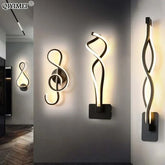 Modern Wall Lamps in black aluminum with glowing acrylic twisted loop designs and up-down LED illumination
