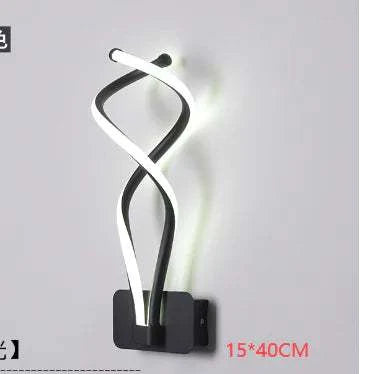 Modern Wall Lamps in black and white aluminum with acrylic LED lights, featuring a twisted, contemporary up-down design.