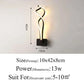 Modern Wall Lamps with black aluminum base, curved acrylic light strips, and warm LED illumination in a sleek, contemporary design.