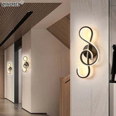 Modern Wall Lamps featuring black aluminum bodies with illuminated treble clef design and warm white LED lighting for stylish decor.