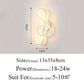 Modern Wall Lamps featuring a white, curved acrylic design with integrated LED lighting and a sleek minimalist style.