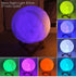 Moon Lamp with natural wooden stand featuring detailed lunar texture and vibrant LED colors including purple, green, yellow, blue, white, pink, orange, and cyan in a 7-color cycle