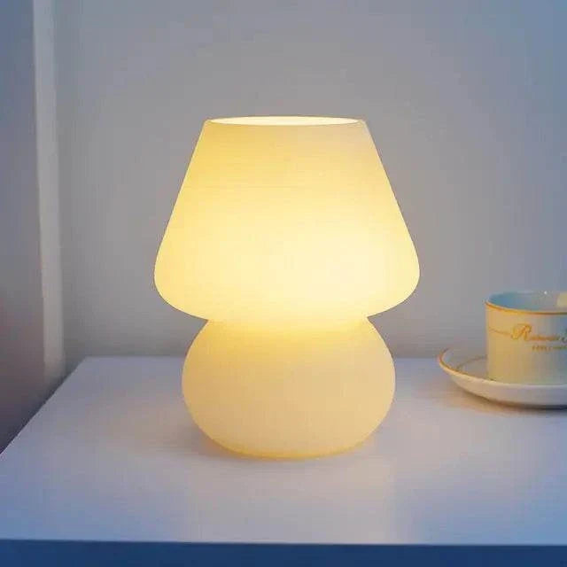 Mushroom LED Lamp in frosted white glass with a soft warm glow and compact mushroom shape, ideal for desk or side table lighting