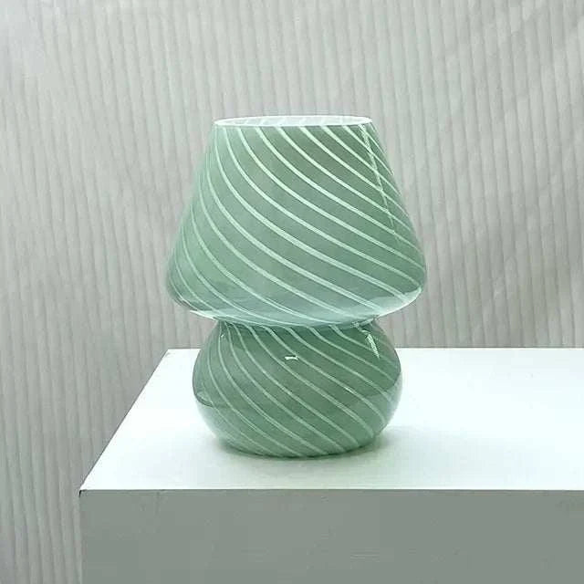 Mushroom LED Lamp made of green glass with white spiral stripes, featuring a smooth rounded base and conical shade