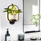Modern wall plant LED lamp with greenery and soft LED lighting on wall