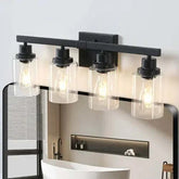 Black rustic farmhouse wall-mounted lamp with four glass bulbs and iron frame