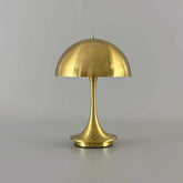Portable Rechargeable LED Lamp with dimming feature, metallic gold finish and dome-shaped shade, sleek alloy and acrylic construction