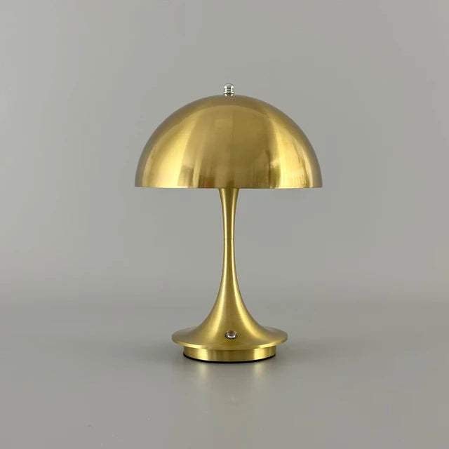 Portable Rechargeable LED Lamp with dimming feature, metallic gold finish and dome-shaped shade, sleek alloy and acrylic construction