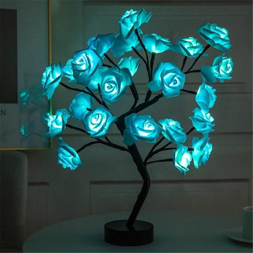 Rose Tree Lamp featuring glowing blue synthetic rose petals on a sturdy black metal branch structure with ambient lighting