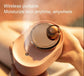Rotating Planet Aroma Diffuser in soft pink with a shiny bronze rotating planet on top releasing a gentle mist
