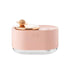 Rotating Planet Aroma Diffuser in soft pink with clear base, featuring a wooden rotating planet design and touch buttons