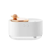Rotating Planet Aroma Diffuser in white with a clear base and a decorative wooden rotating planet detail on top