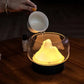 Ultrasonic air humidifier with LED lamp creating a soothing ambiance in a modern living space