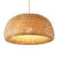 Kuma Bamboo Lamp emitting warm light, eco-friendly bamboo design for cozy, stylish home decor