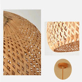 Kuma Bamboo Lamp emitting warm light in eco-friendly bamboo design