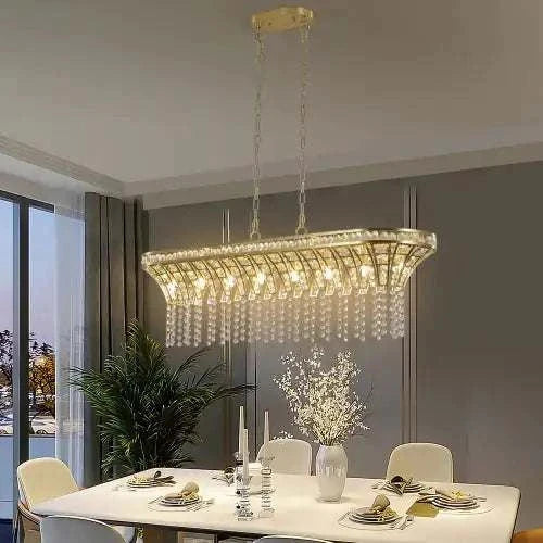 Modern champagne gold kitchen island lamp with oval crystal chandelier and adjustable height chain