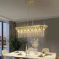 Modern champagne gold kitchen island lamp with oval crystal chandelier and adjustable height chain