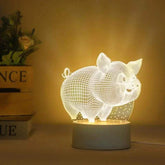 3D LED Lamp shaped like a pig with wireframe design, emitting soft white light with a warm glow