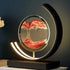 Sandscape LampIlluminate your space with the mesmerizing Sandscape of Time Lamp. Beyond its function as a lamp, this unique piece combines moving sands with a gentle LED glow, creAlphas lightAlphas lightSandscape Lamp