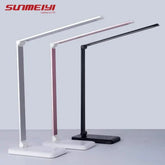 LED Desk Lamp in black, white, and rose gold colors, featuring a sleek modern design with adjustable arms and matte finish