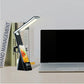 LED Study Lamp in black ABS with slim adjustable LED arm, digital clock display, and wireless charging stand for phones