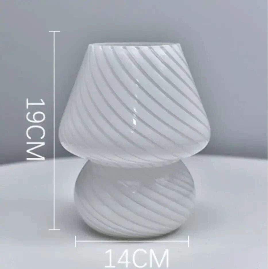 Mushroom LED Lamp made of clear white glass with diagonal swirl pattern, compact 19cm height and 14cm width design