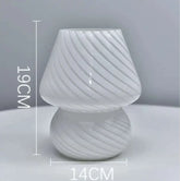 Mushroom LED Lamp made of clear white glass with diagonal swirl pattern, compact 19cm height and 14cm width design