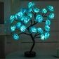 Rose Tree Lamp with glowing blue synthetic rose petals on black metal branches and base providing ambient lighting