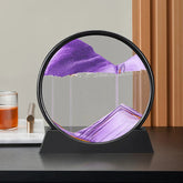 Sand Frame with black circular acrylic enclosure and vibrant purple sand creating shifting textured patterns inside