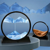 Sand Frame with vibrant blue and orange sand in black circular acrylic frames creating textured mountain and dune patterns